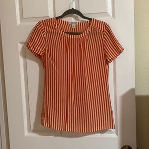 orange and white blouse